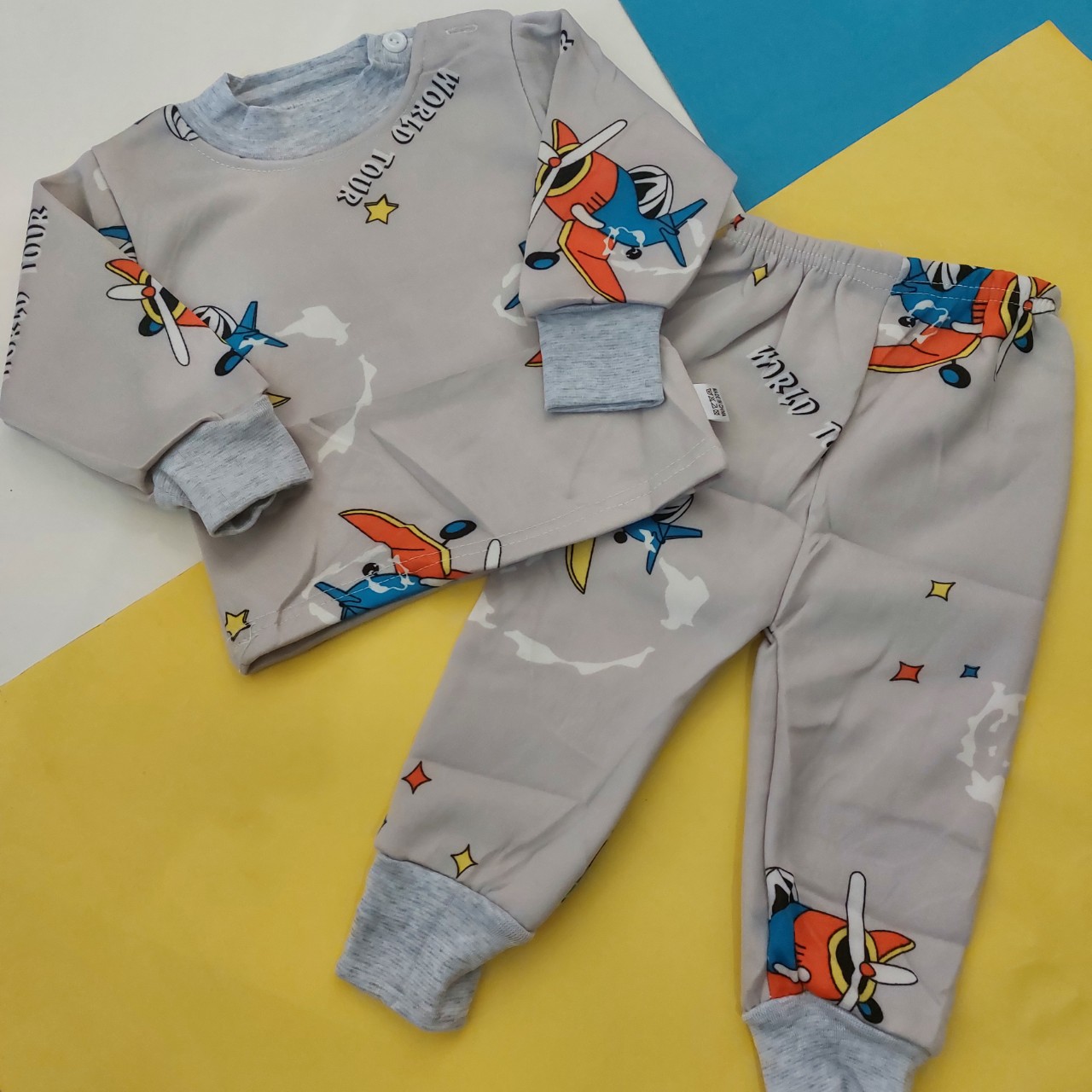 بلوز شلوار توکرکی طوسی نقلی طرح هواپیما وارداتی